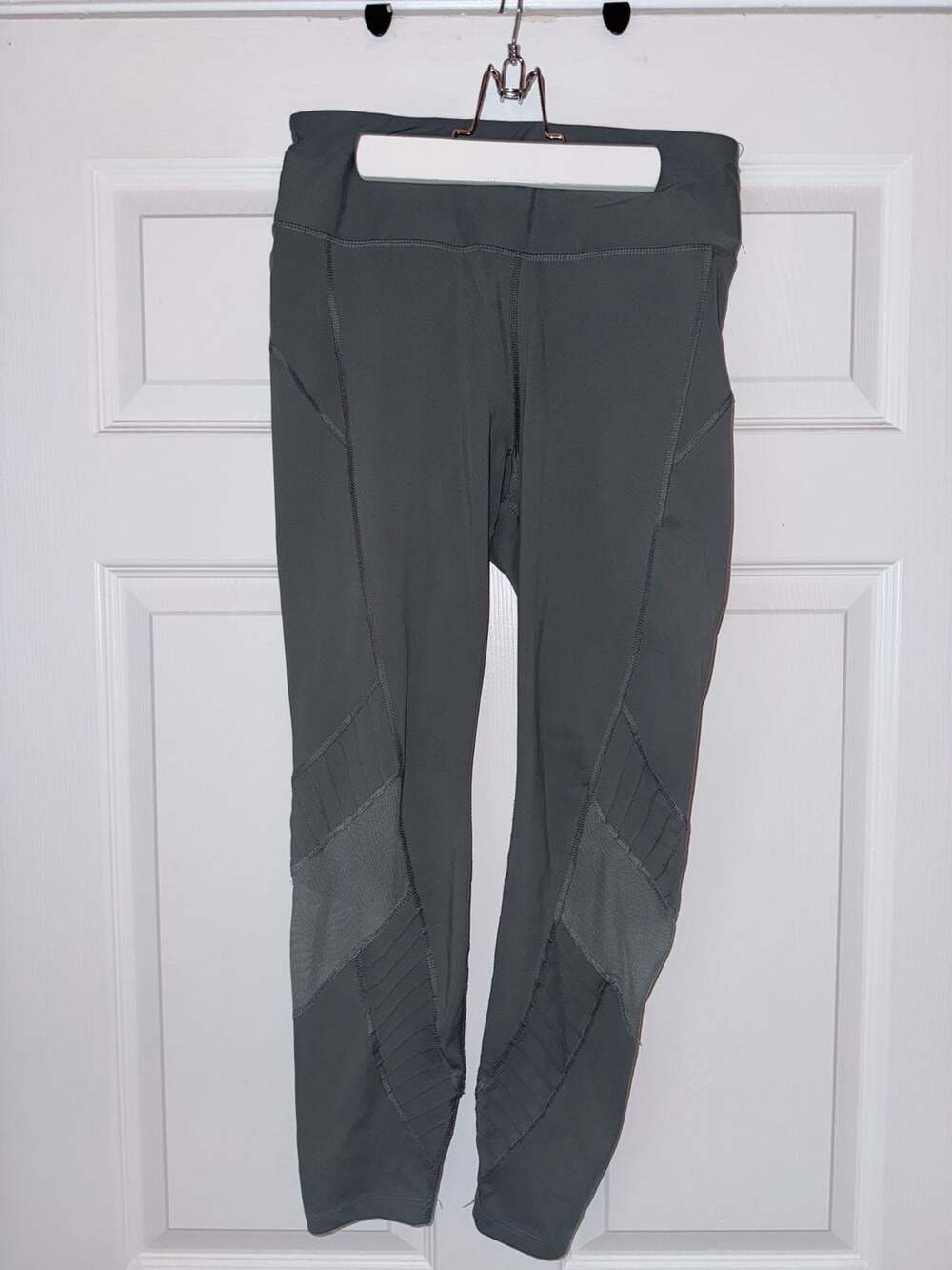 Avia athletic forest green leggings with mesh striping. Size M/L